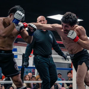 Zaid landing a right cross on his opponent during the second round of the New Money Fight Club.